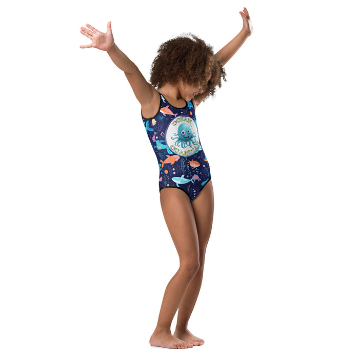 Stylish Kids Swimsuit with a science-based design and vibrant colors for a trendy beach look.